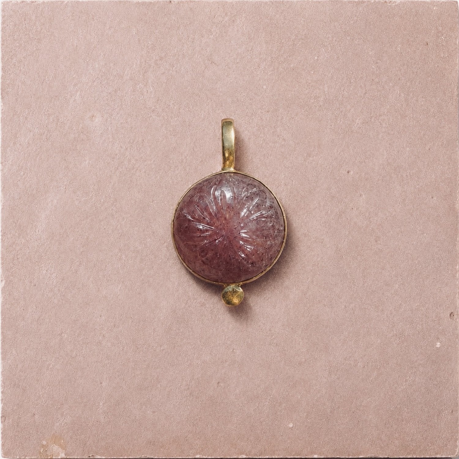 NilaCarvedStonePendant-CherryQuartz-01_23395255-0bc0-4d51-8c43-198ec6e9ead9.jpg