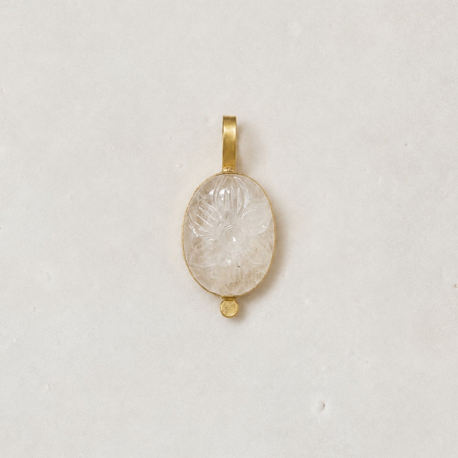 NilaCarvedStonePendant-CrystalQuartz-01_4f3254d2-353d-468d-8d88-f6d7b2235e11.jpg