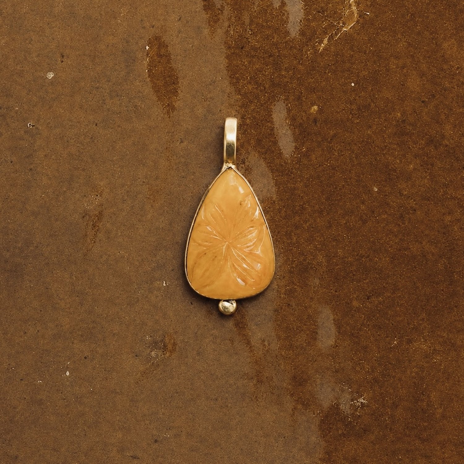 NilaCarvedStonePendant-GoldenJade-01_eec05801-ff57-4de5-904a-28cd32ee93ec.jpg